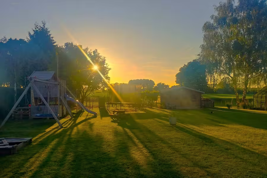Photo immobilière avec coucher de soleil très accentué